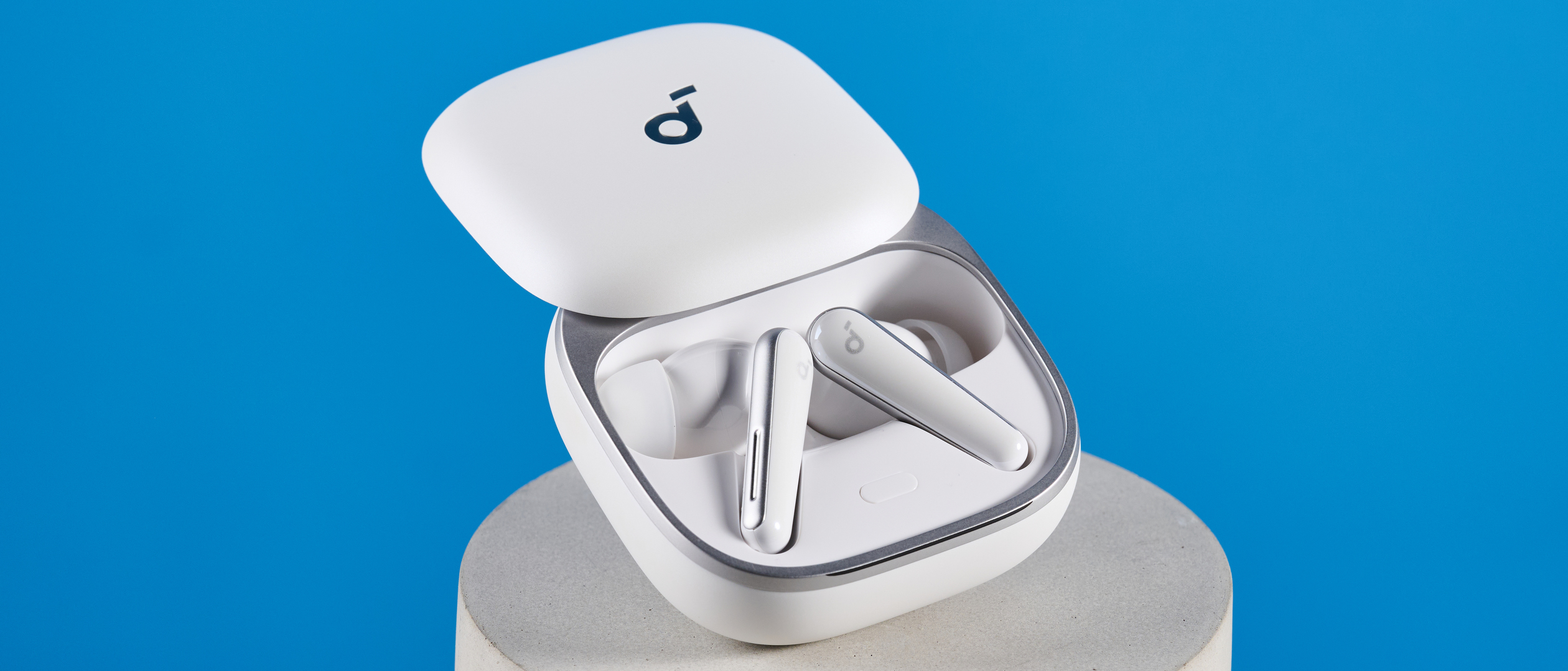 The Soundcore Liberty 5 photographed in front of a blue background. 