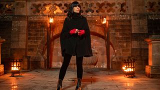 Claudia Winkleman stood in front of the castle for The Traitors season 2