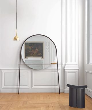 A hallway mirror idea with console-style legs