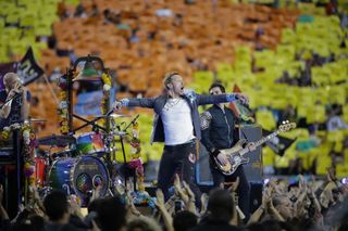 Coldplay singer Chris Martin performs during halftime of the NFL Super Bowl 50 football game between the Denver Broncos and the Carolina Panthers