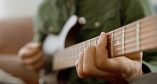 Close-up of guitar playing