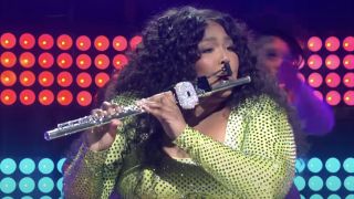 Lizzo playing the flute on SNL