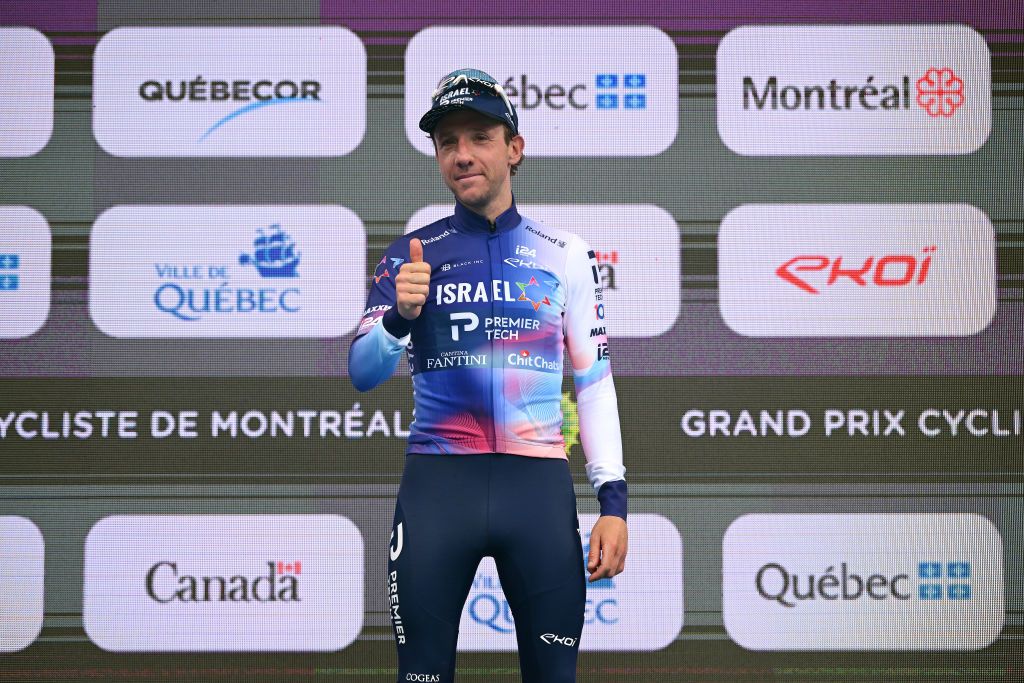 MONTREAL QUEBEC SEPTEMBER 10 Michael Woods of Canada and Team IsraelPremier Tech celebrates at podium as best Canadian rider during to the 12th Grand Prix Cycliste de Montreal 2023 a 2214km one day race from Montreal to Montreal UCIWT on September 10 2023 in Montreal Quebec Photo by Dario BelingheriGetty Images