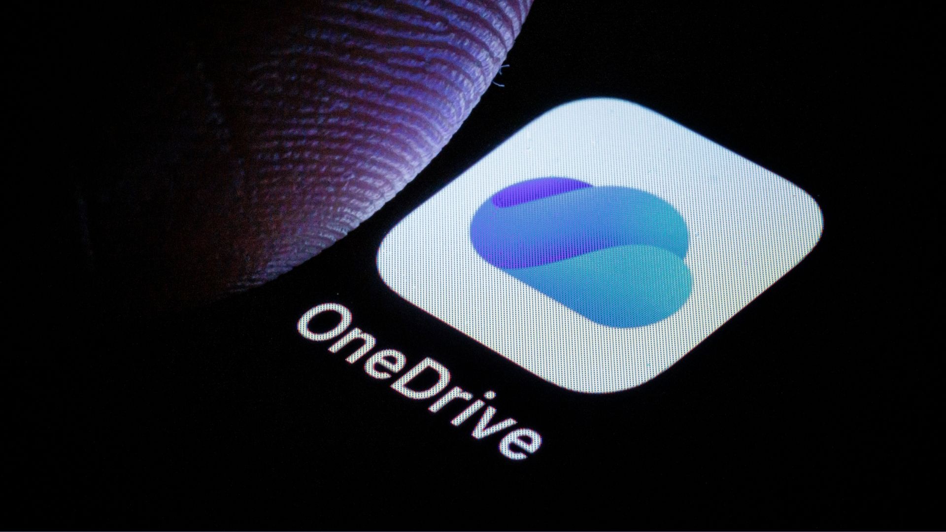 Microsoft OneDrive logo against a black background