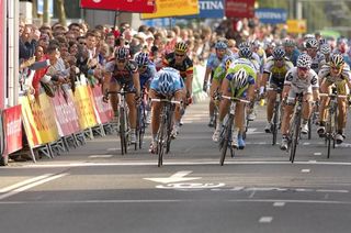 German Gerald Ciolek (Milram) beats Fabio Sabatini (Liquigas) in Vuelta a España stage two, l-r.