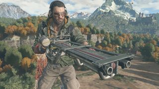 Kyle Crane holding a sawblade launcher
