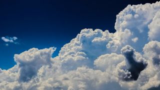 photo of white clouds against a blue sky