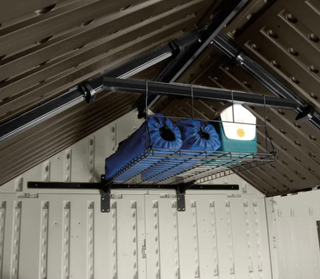 Roof mounted attic storage