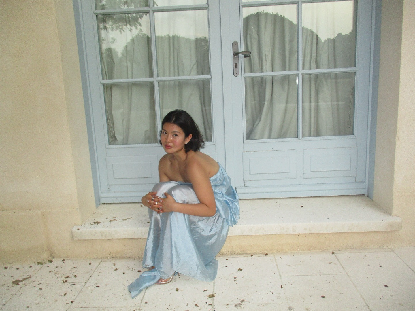 Influencer @alllisonho wears an icy blue strapless dress.