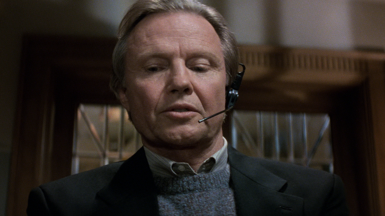 Jon Voight with a headset on in Mission: Impossible
