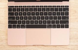 asus zenbook vs macbook keyboard apple