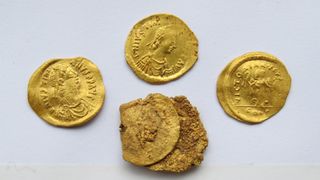 Four gold coins