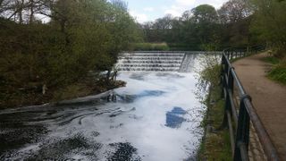 Water flowing over a weir