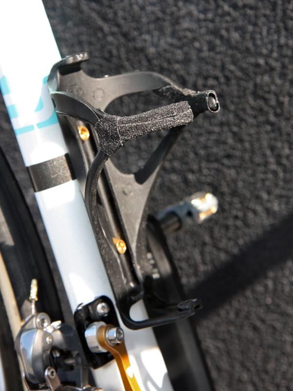 Trek Bat cages are supplemented with friction tape to prevent bottles from ejecting on the cobbles.