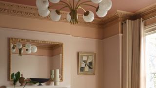 Colour capped living room with peach coloured ceiling