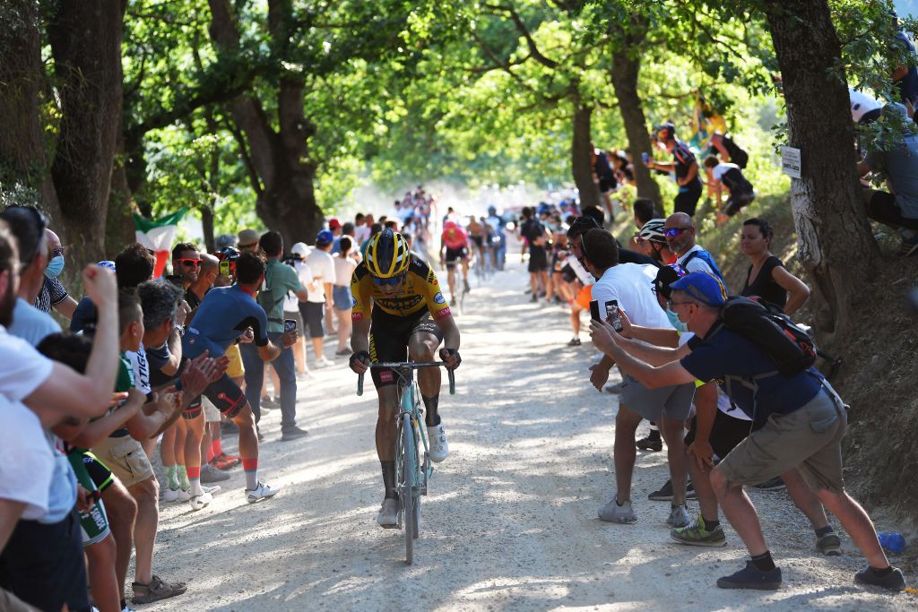 SIENA ITALY AUGUST 01 Wout van Aert of Belgium and Team JumboVisma Fans Public during the Eroica 14th Strade Bianche 2020 Men a 184km race from Siena to SienaPiazza del Campo StradeBianche on August 01 2020 in Siena Italy Photo by Tim de WaeleGetty Images