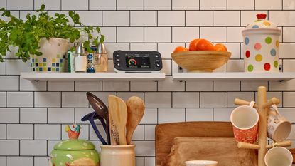 wooden table with smart meter and headphones