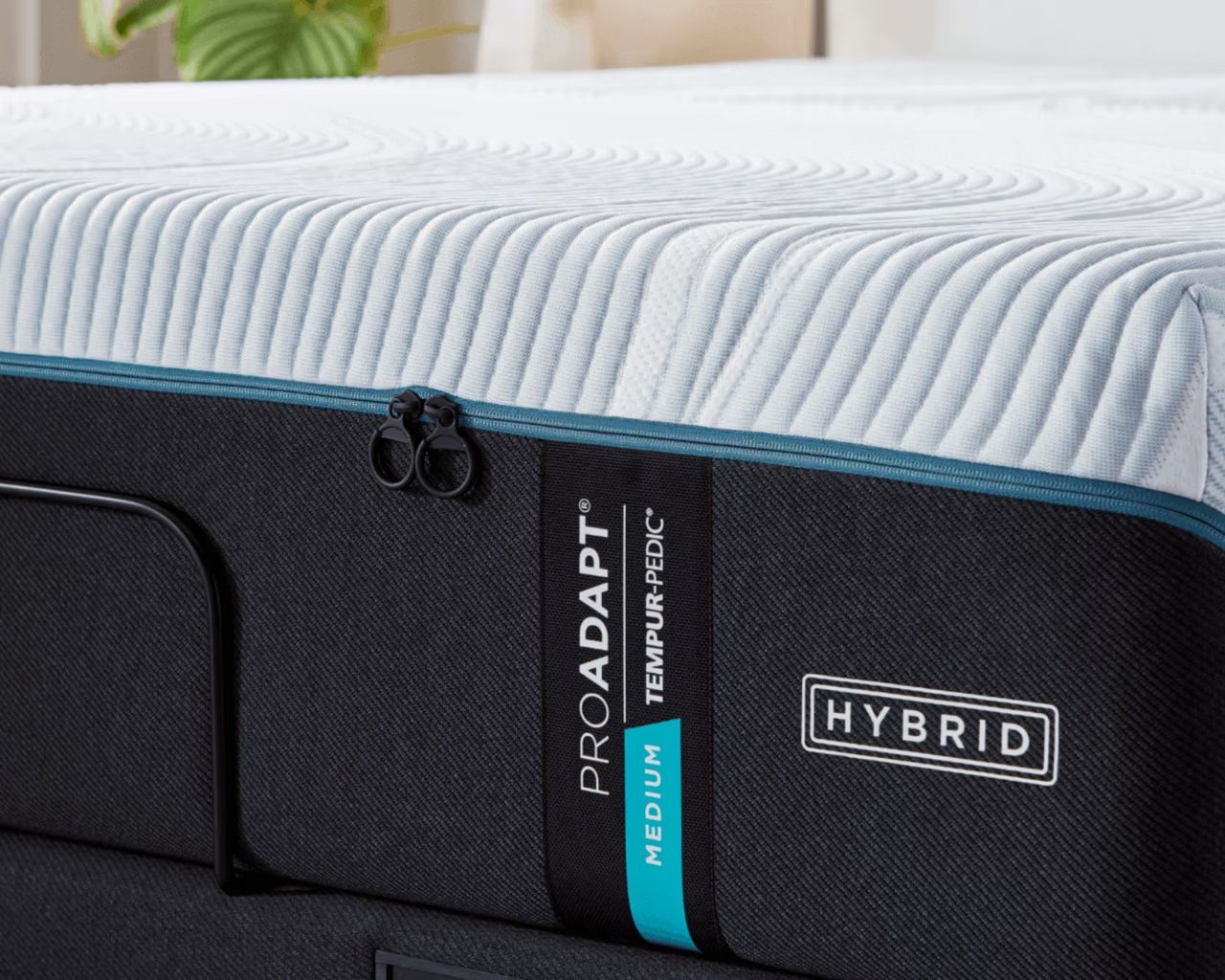 A black and white Tempur-Pedic ProAdapt mattress
