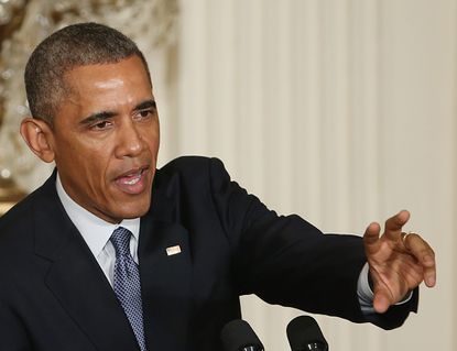 President Obama speaking at a recent news conference 