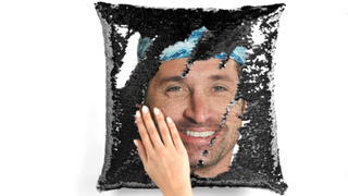 Derek Shepherd's face is shown on a sequin pillow.