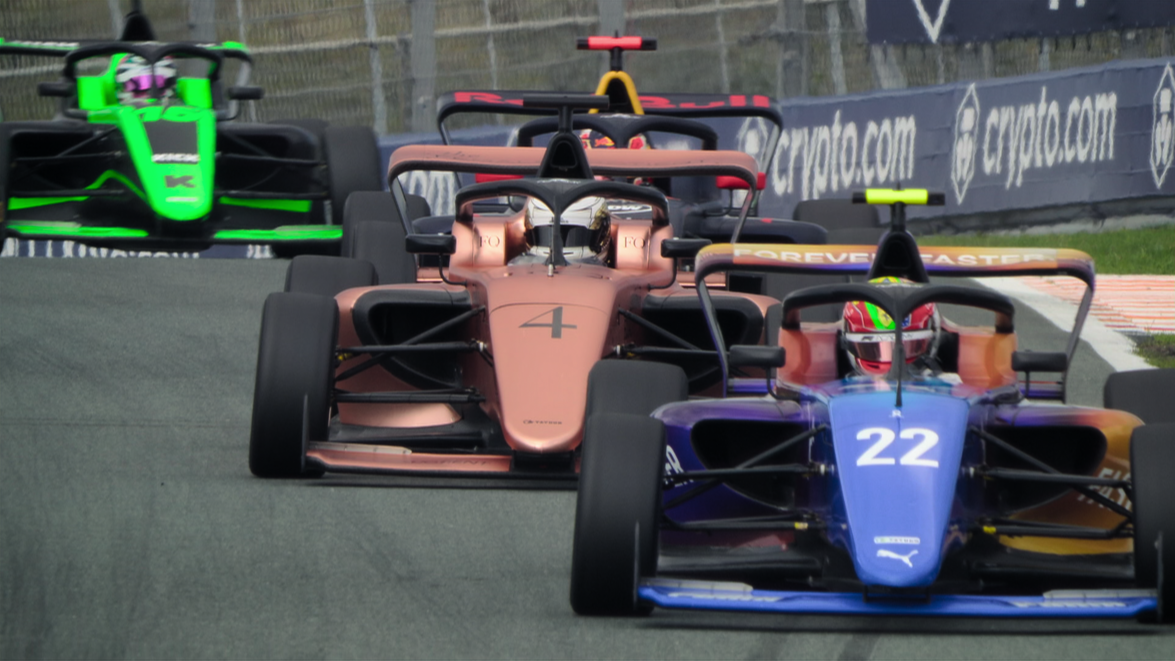 F1: The Academy cars racing around a track.