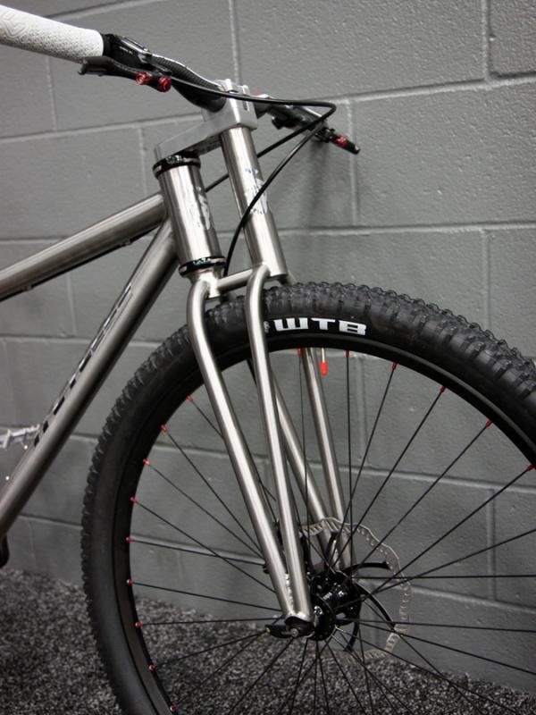 Ti Cycles' triangulated rigid fork reminds us of a certain old-school suspension design