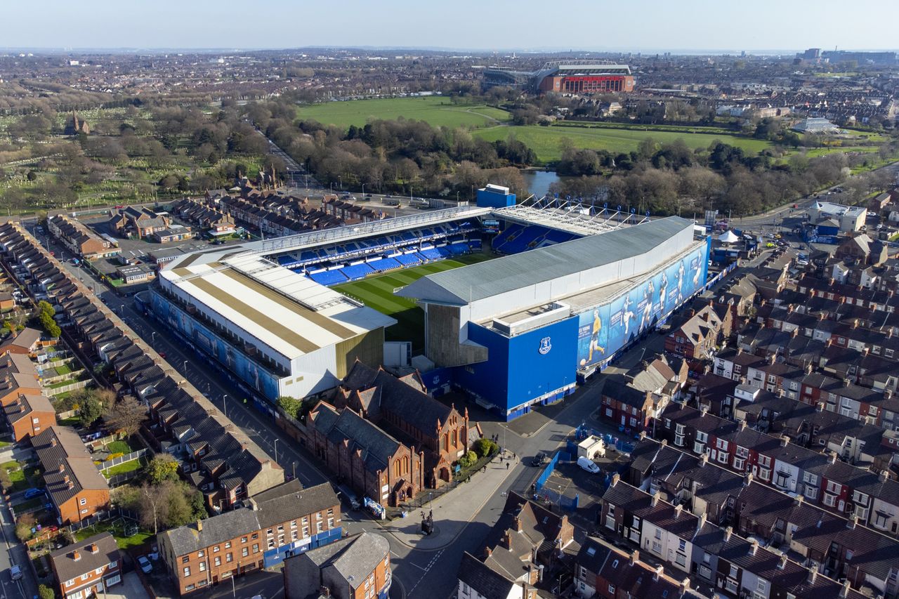 A view of Goodison Park, home of Everton FC, and Anfield, home of Liverpool FC, situated either side of Stanley Park in Liverpool