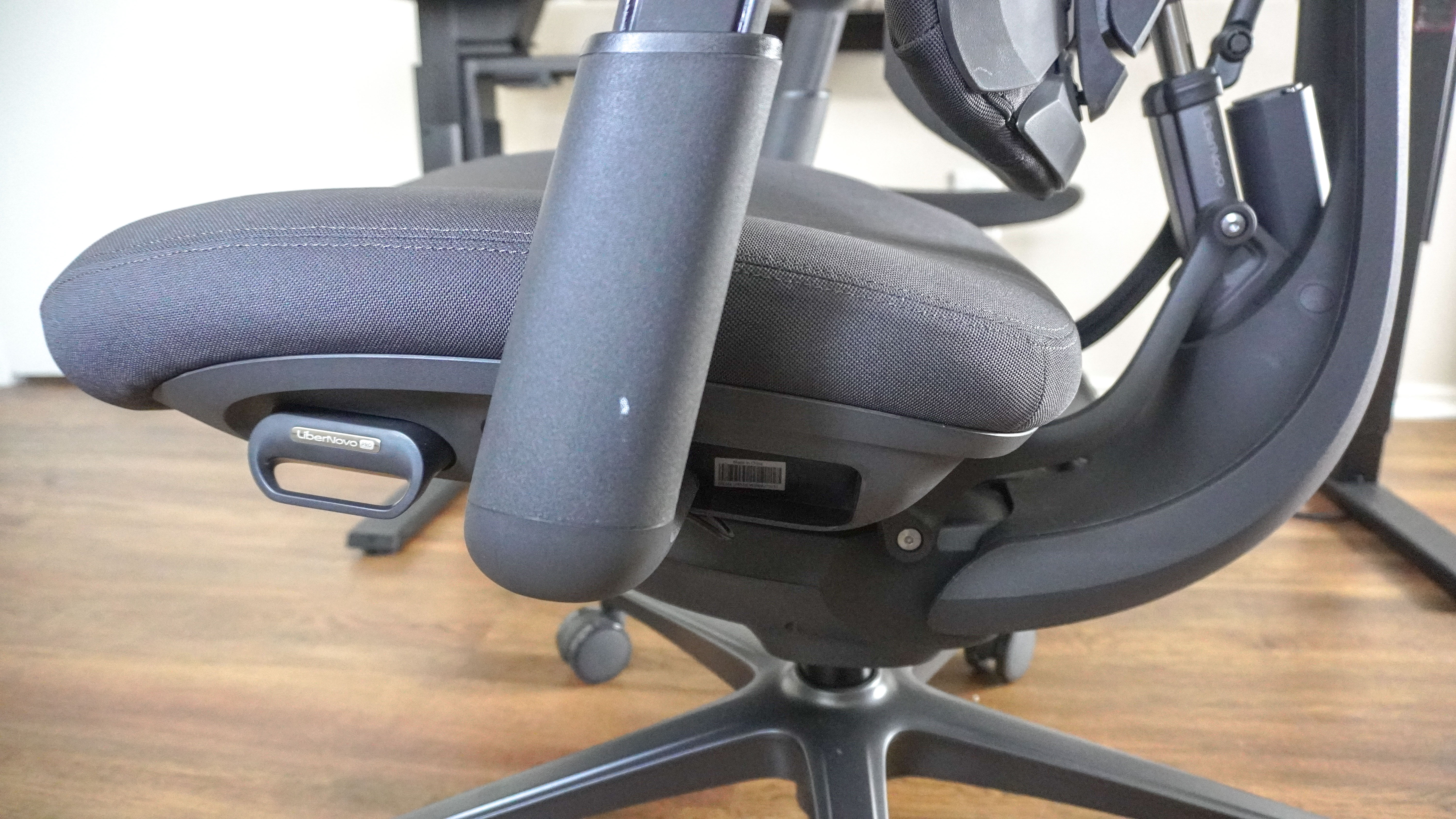 A close-up shot and side view of the LiberNovo Omni Pro's seat and battery