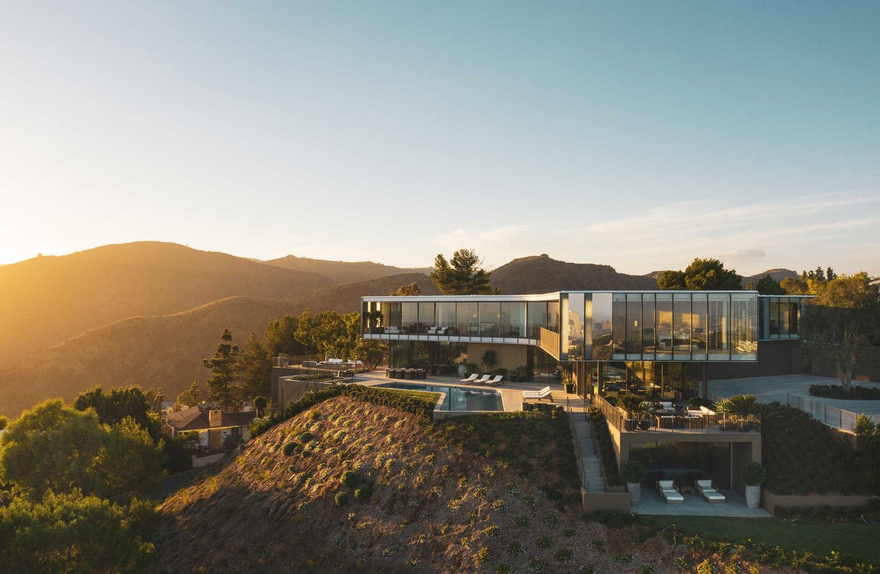 exterior of contemporary glass home in Bel Air