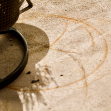 round rust marks from garden furniture on patio