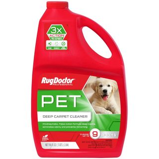 A red bottle of RugDoctor Pet Deep Carpet Cleaner with green and red label, white text, and a picture of a puppy