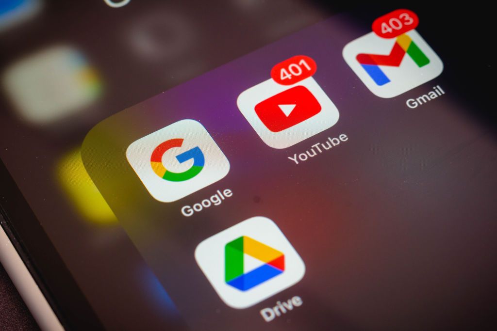 Google apps, including Gmail, Google Drive, and YouTube, displayed on a smartphone