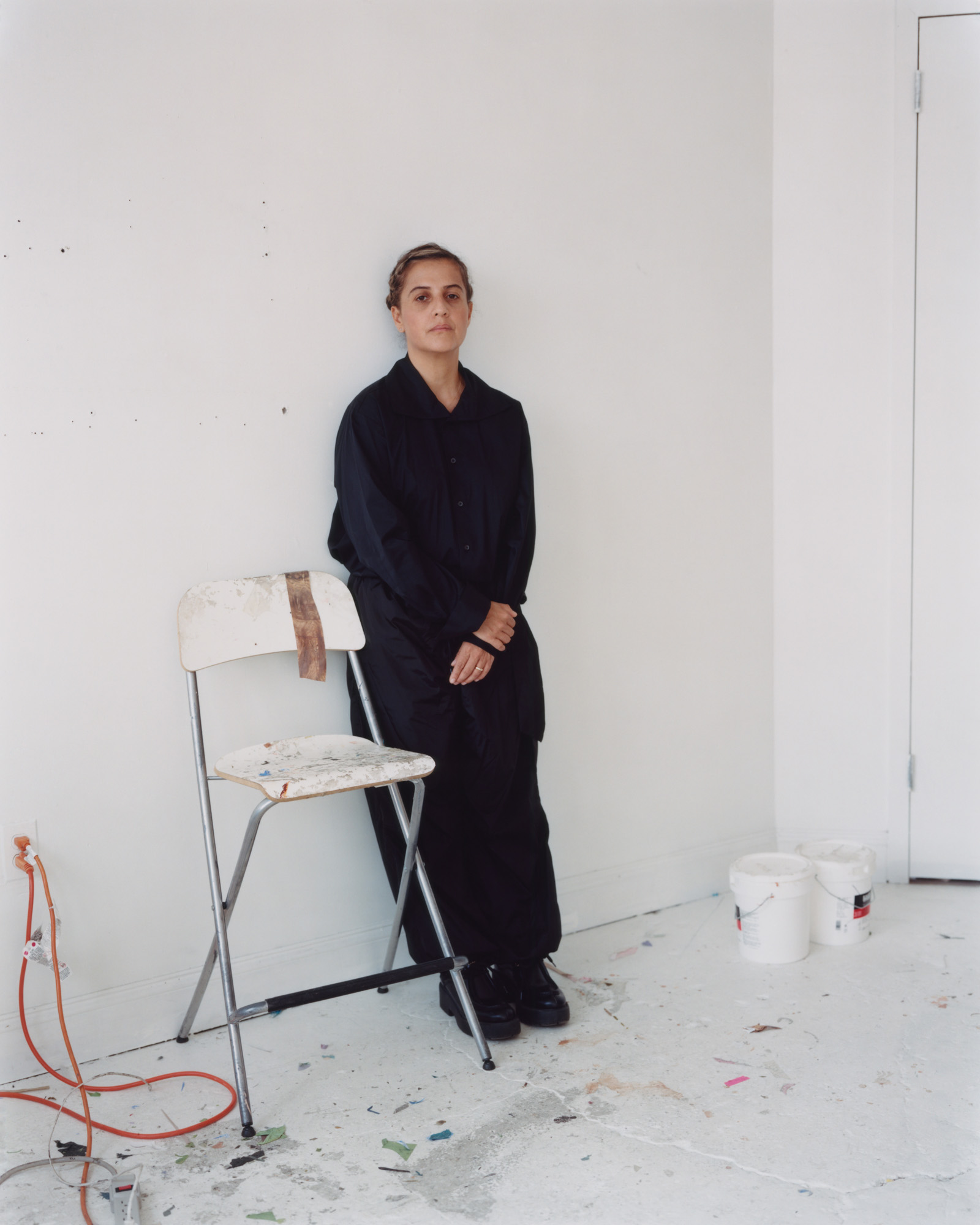Mar&amp;iacute;a Berr&amp;iacute;o wearing black stood in a studio