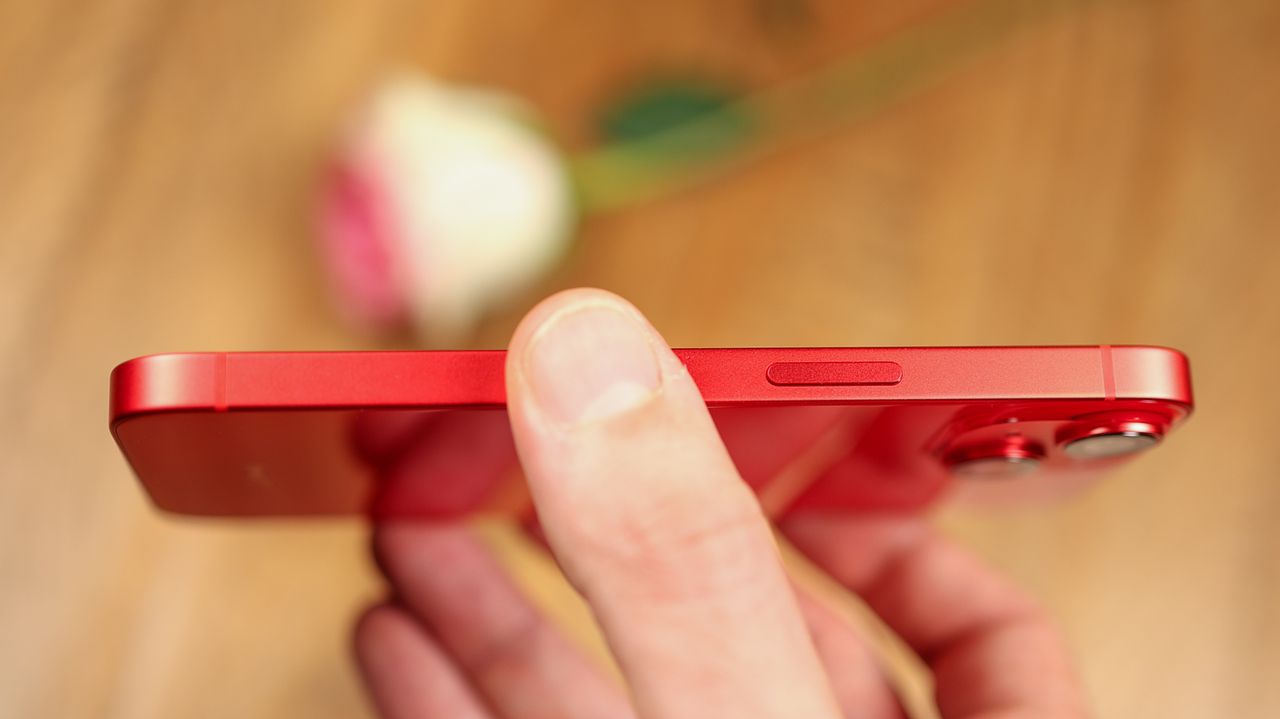 A photo of the iPhone 14 in red