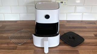 the Mi Smart Air Fryer with its accessories