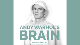 Section of book cover for &#039;Andy Warhol&#039;s Brain&#039; by Dr Phillip Romero, showing black and white photograph of Andy Warhol, a slender white man with blond hair. The book title is written in sage green lettering.