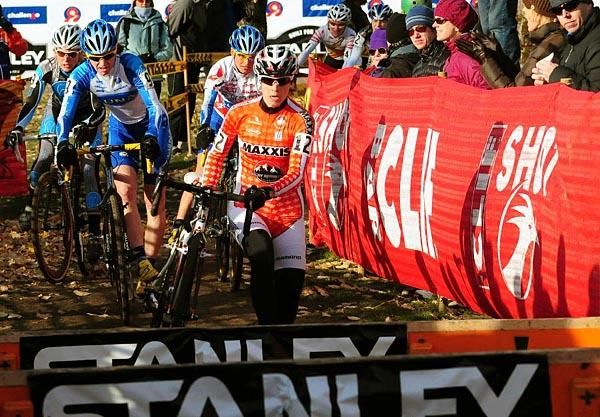 Alision Sydor (Team Maxxis-Rocky Mountain) leading over the barriers on the first lap.
