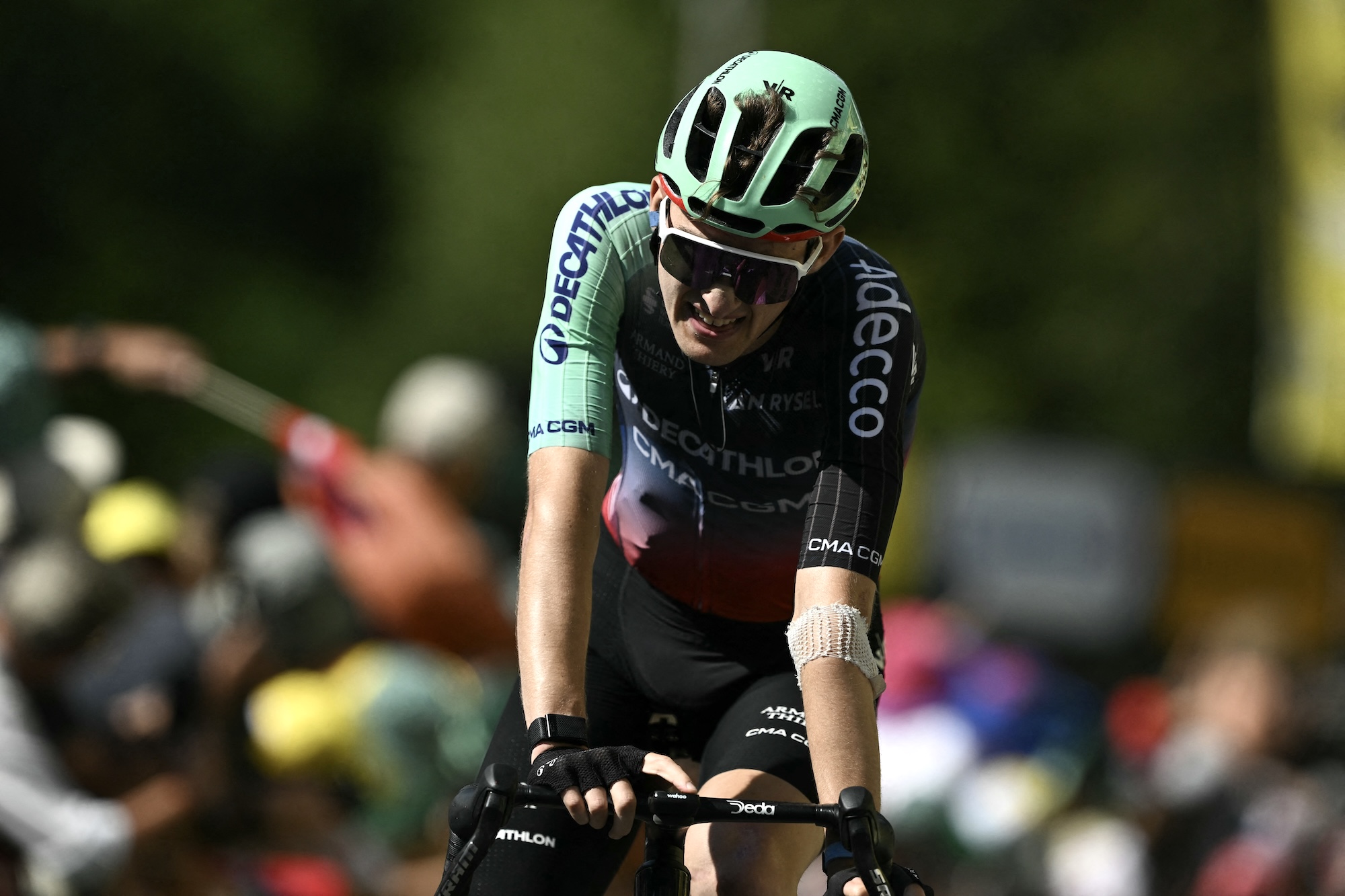 Decathlon CMA CGM Team's French rider Paul Seixas cycles to the finish line to take third place in the 10th stage of the 113th edition of the Tour de France
