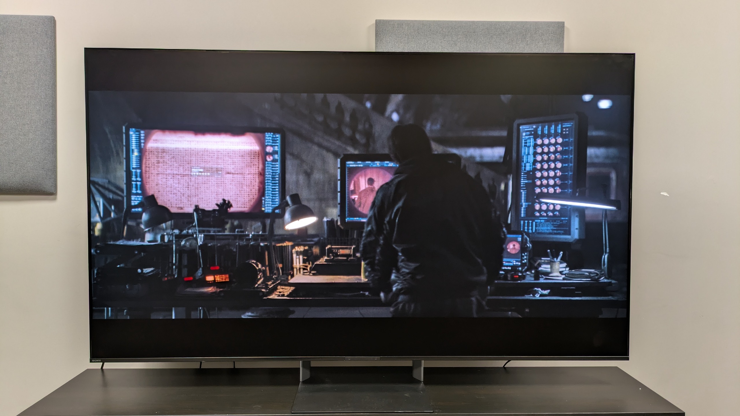 Sony Bravia 9 II with a shot of Bruce in the Batcave from The Batman on screen. The TV shows great contrast even in bright conditions