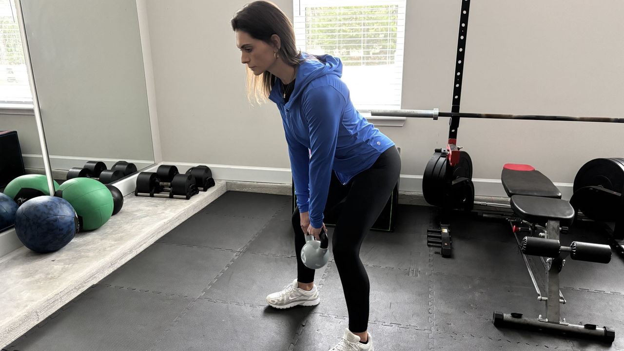 Tami Smith demonstrates a kettlebell swing