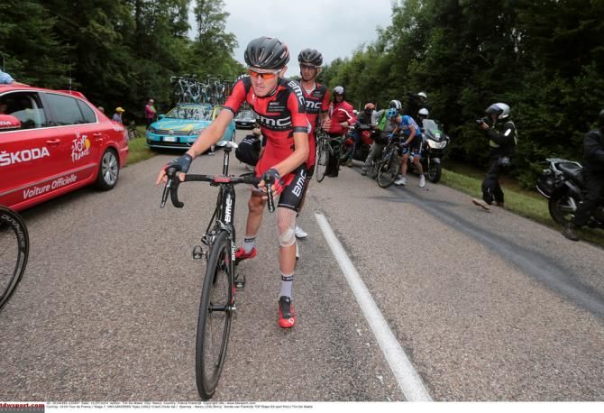 Tejay van Garderen (BMC) gets back on his bike after crashing