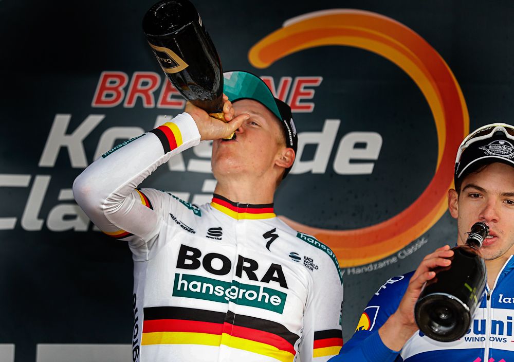 redene-Koksijde winner Pascal Ackermann celebrates on the podium