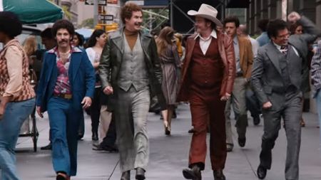 Will Ferrell walking with the boys through the city in Anchorman 2: The Legend Continues