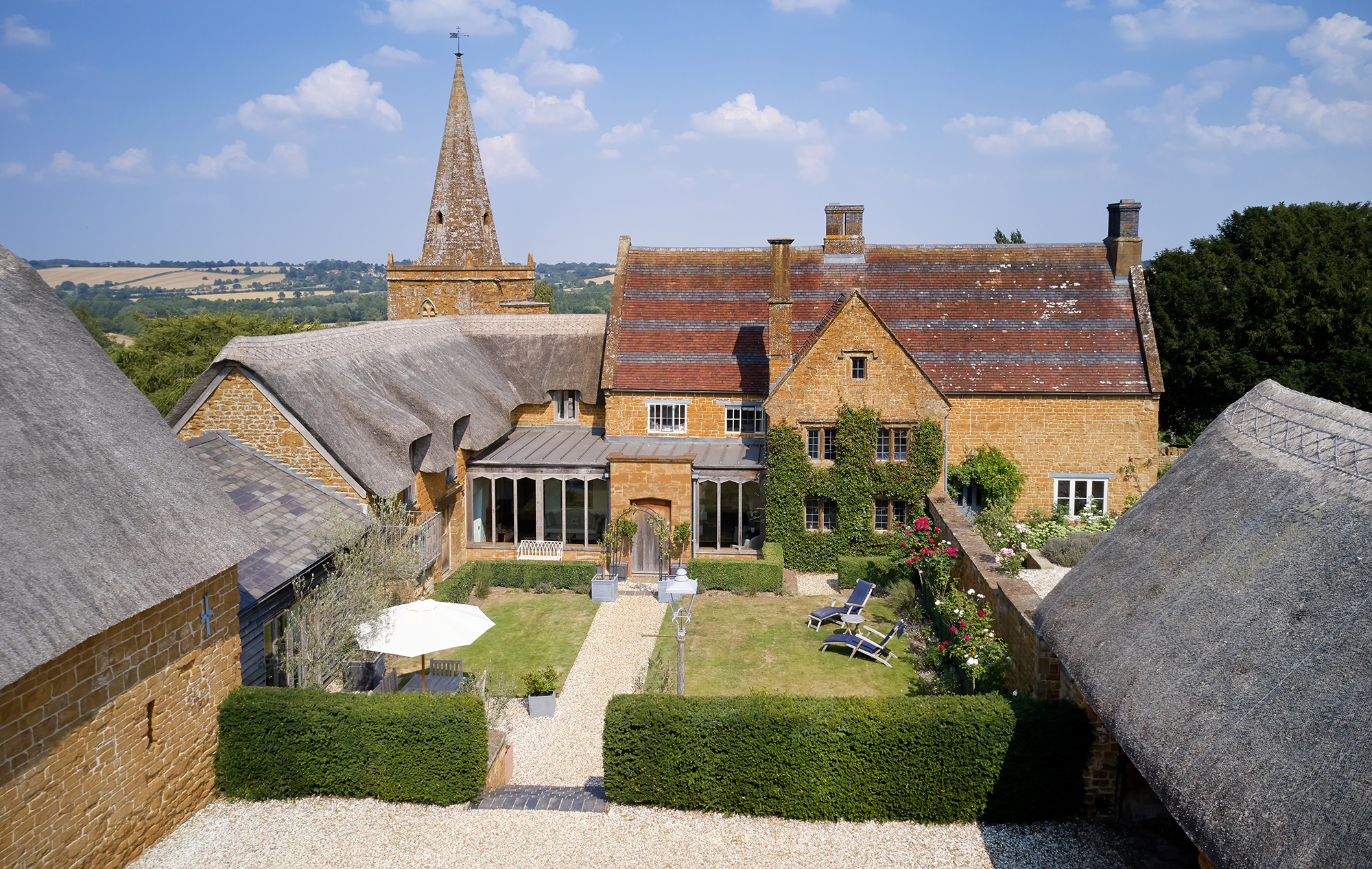 exterior of church farm with garden savills