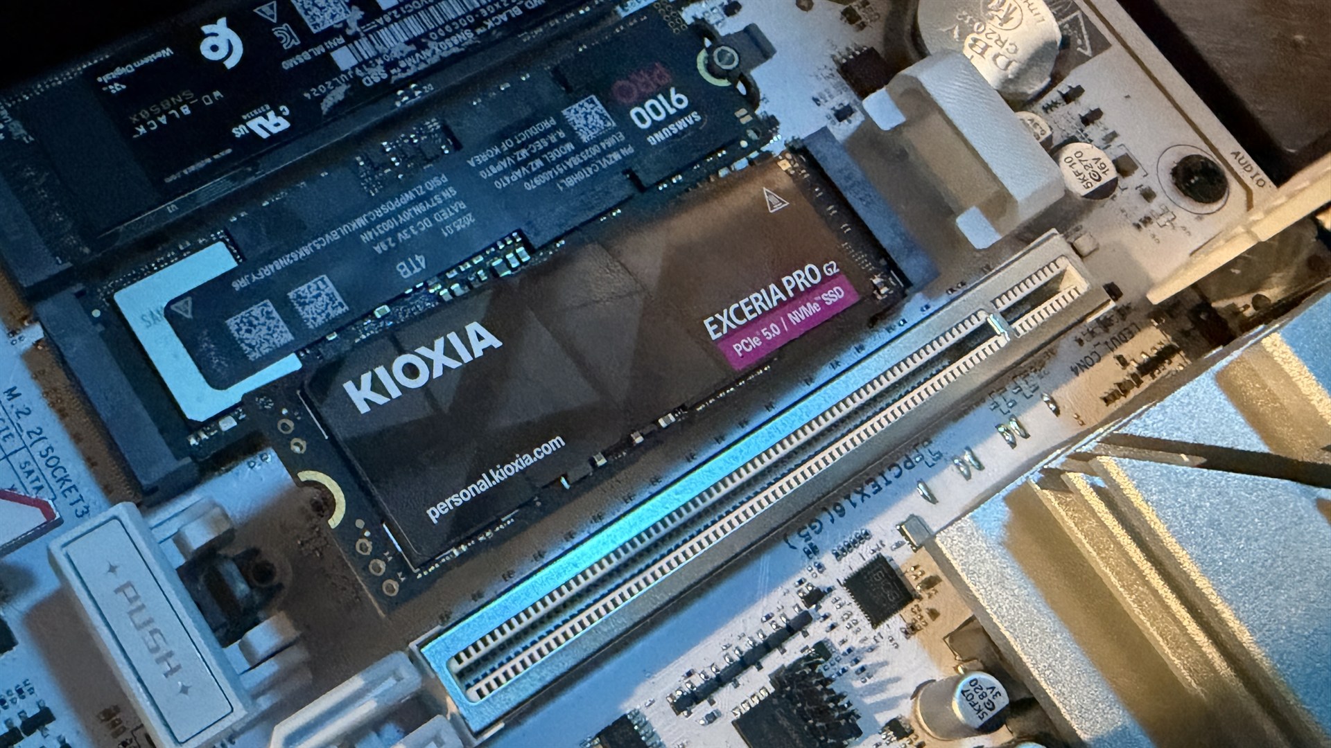 The Kioxia Exceria Pro G2 SSD ready to be installed inside a gaming PC.