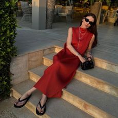 @annabelrosendahl red dress and black flip flops summer outfit