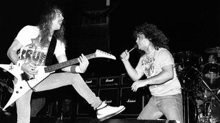 Gary Holt goes metal thrashing mad onstage with Exodus vocalist Steve 'Zetro' Souza in the 80s