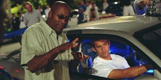 John Singleton and Paul Walker on the set of 2003's 2 Fast 2 Furious