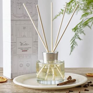 the White Company Winter diffuser glass bottle with rattan reeds