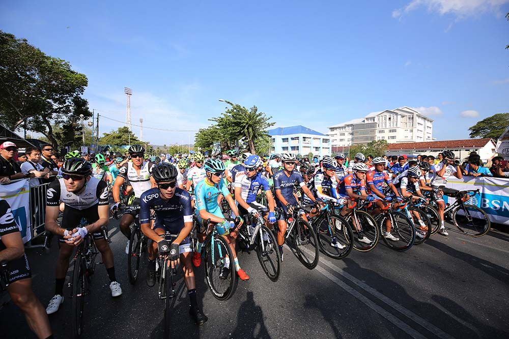 The riders line up for the roll out